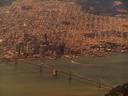Flying over San Francisco with Bay Bridge and downtown SF views.